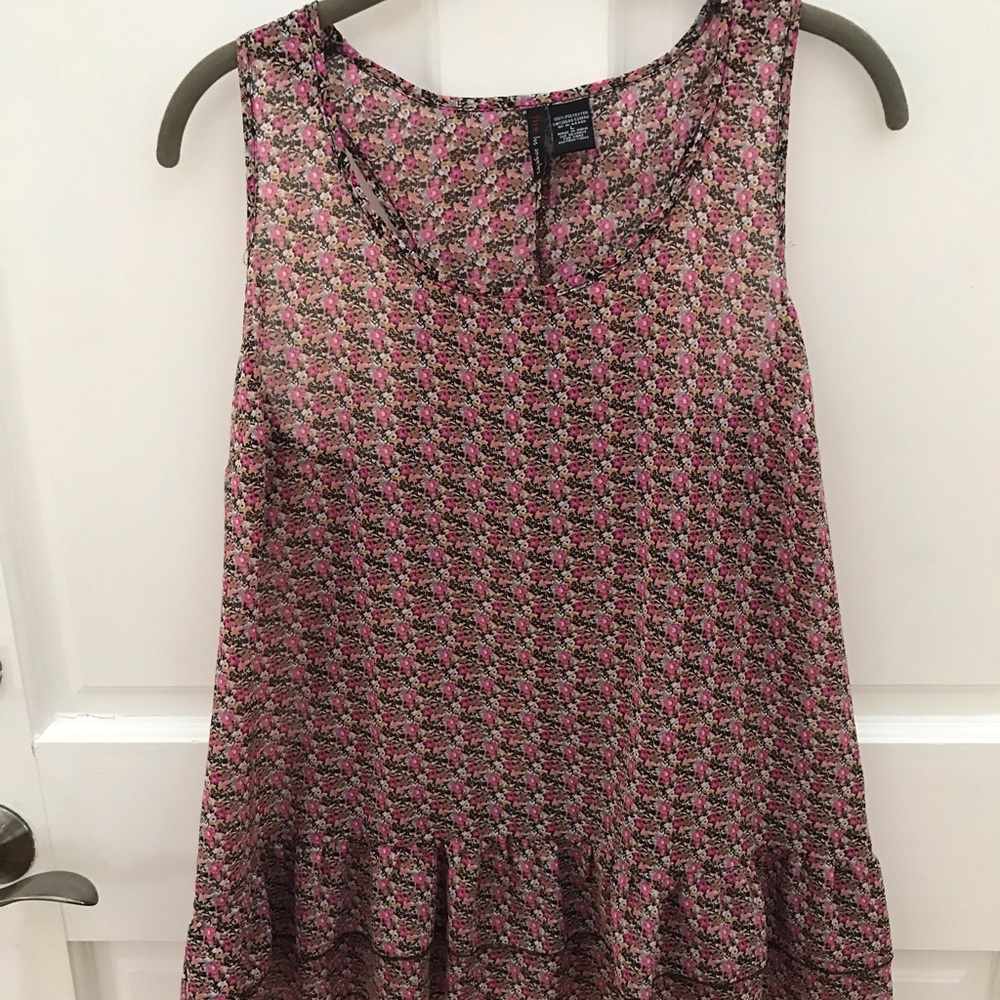 Longer cut tank top with bottom ruffle